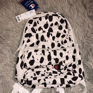 champion cow print backpack